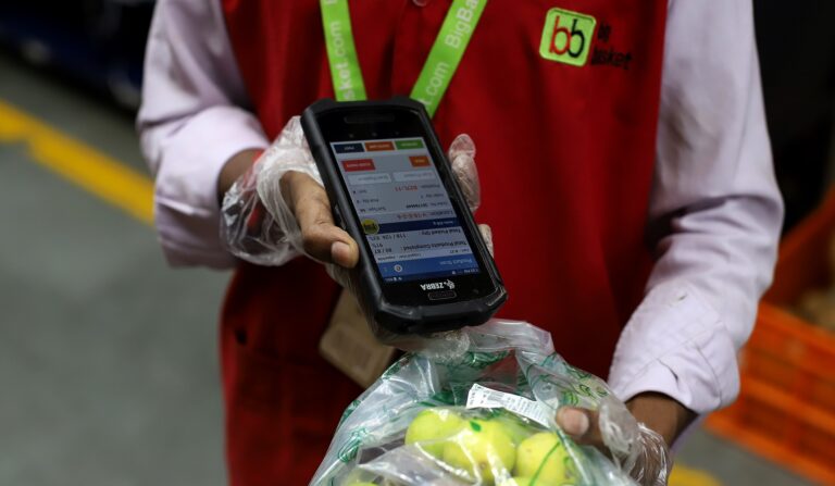 retail supervisor checking product at warehouse