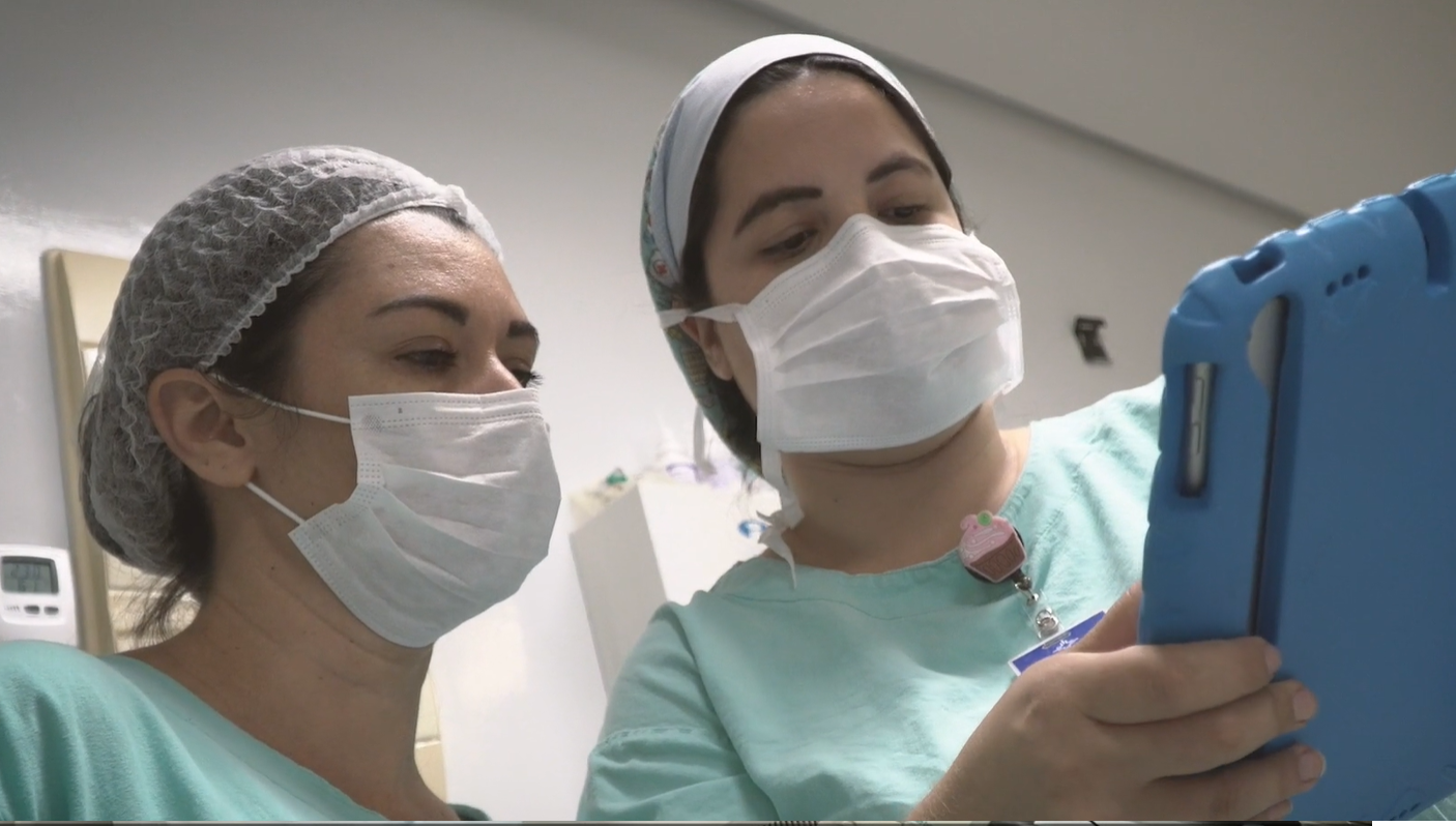 nurses analyzing data